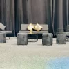 event setup with black furniture. black ottoman stool hire