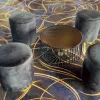 black ottoman stool hire and black wire coffee table hire