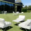 white velvet arm chair and sofa lounge outdoors